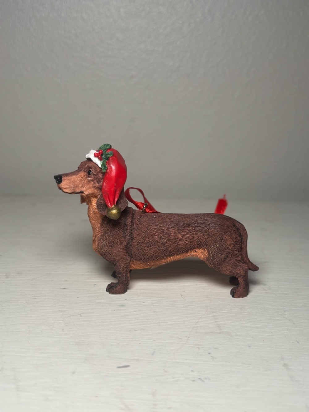 Holiday Dachshund Ornament in Brown with Red Santa Hat